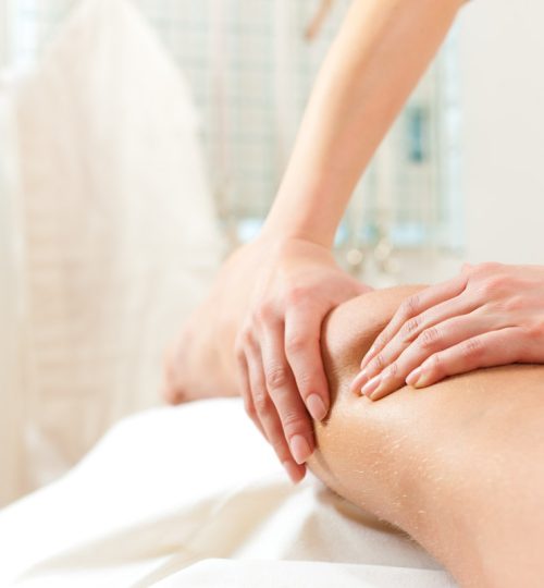 Patient at the physiotherapy gets massage or lymphatic drainage